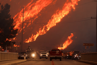 New wildfire imperils homes in Los Angeles, 20,000 ordered to evacuate