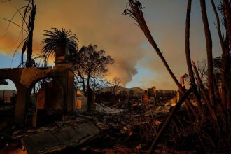 Worst yet to come? Gusty wind warning raises worries as wildfire rages in Los Angeles