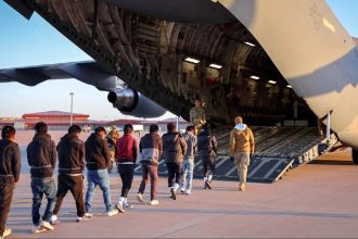 First military flight lands in Guantanamo Bay with migrants deported from the US