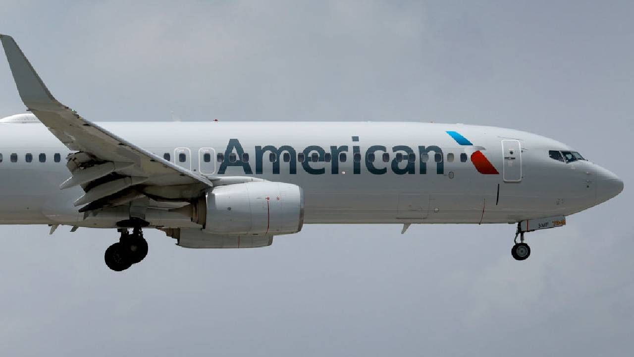 American Airlines plane catches fire at Denver airport gate; passengers evacuated on slides
