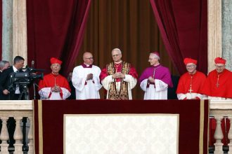 In his first words, Pope Leo XIV says ‘Peace be with you’