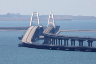 Ukraine hits key Russian-built Crimea bridge with underwater explosives