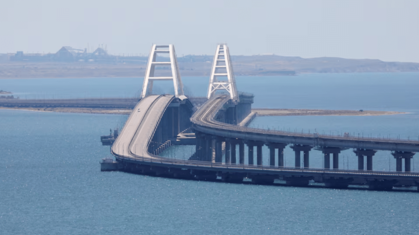 Ukraine hits key Russian-built Crimea bridge with underwater explosives